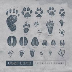 Corb Lund - Cover Your Tracks EP  (12")  - Covers EP w/ songs by Lee Hazlewood, Billy Joel, Marty Robbins & AC/DC. Opaque blue vinyl.